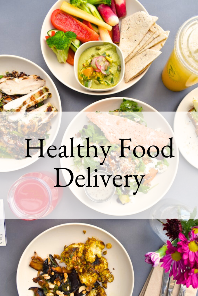 Healthy Food Delivery A table with several healthy dishes and smoothies